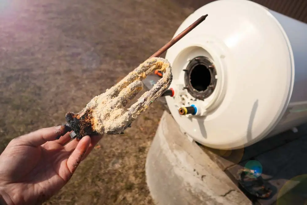 sediment buildup in storage-type water heater