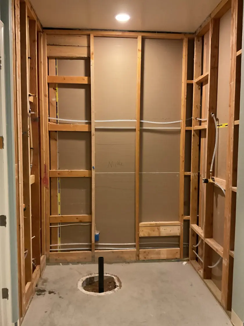 Interior plumbing reroute used to bypass a leaking water line beneath a concrete slab