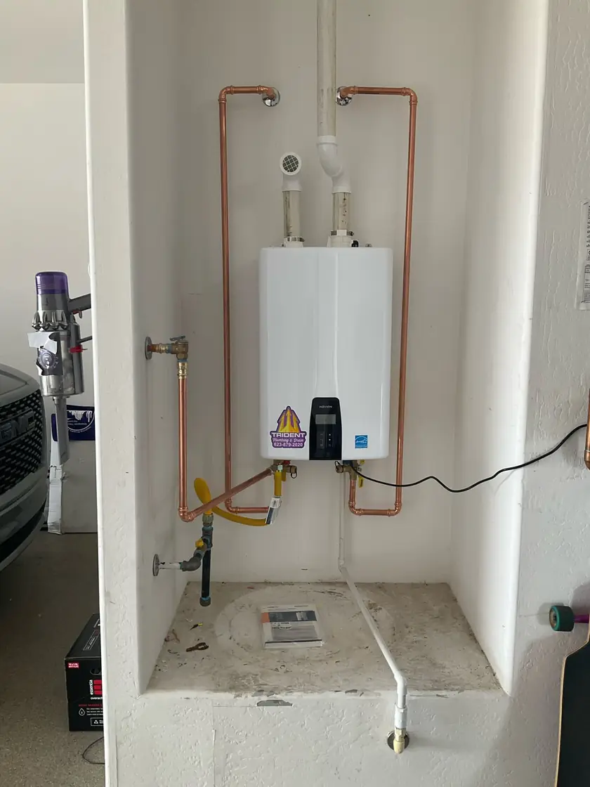 Professionally installed tankless water heater providing energy-efficient hot water for a Phoenix home.