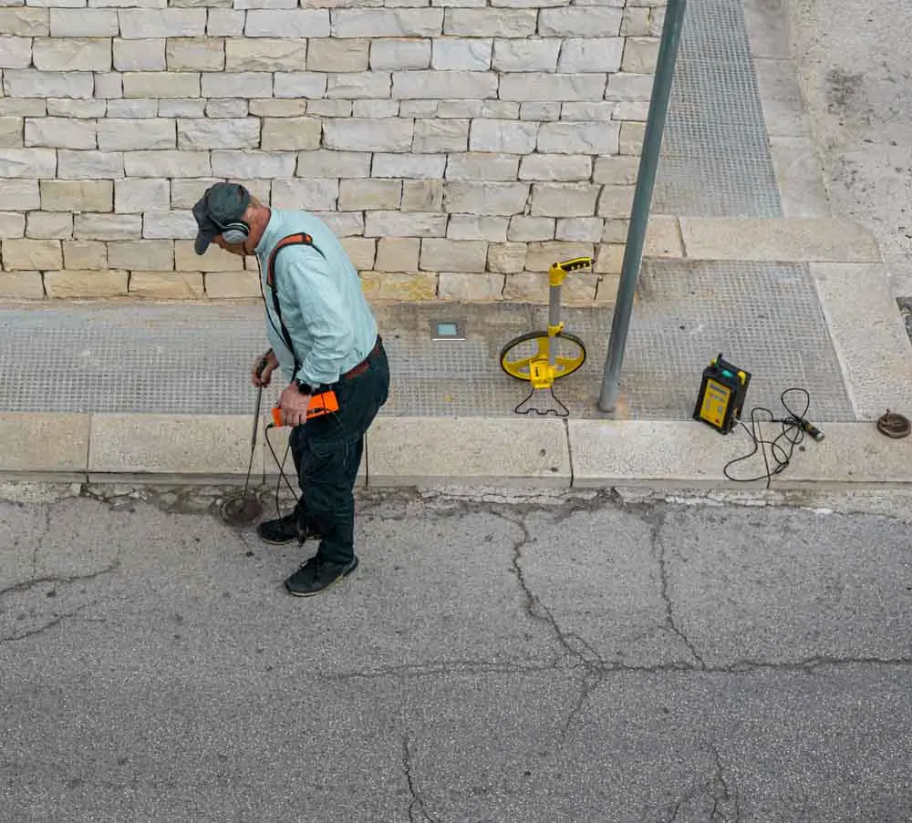 technician performing slab leak detection