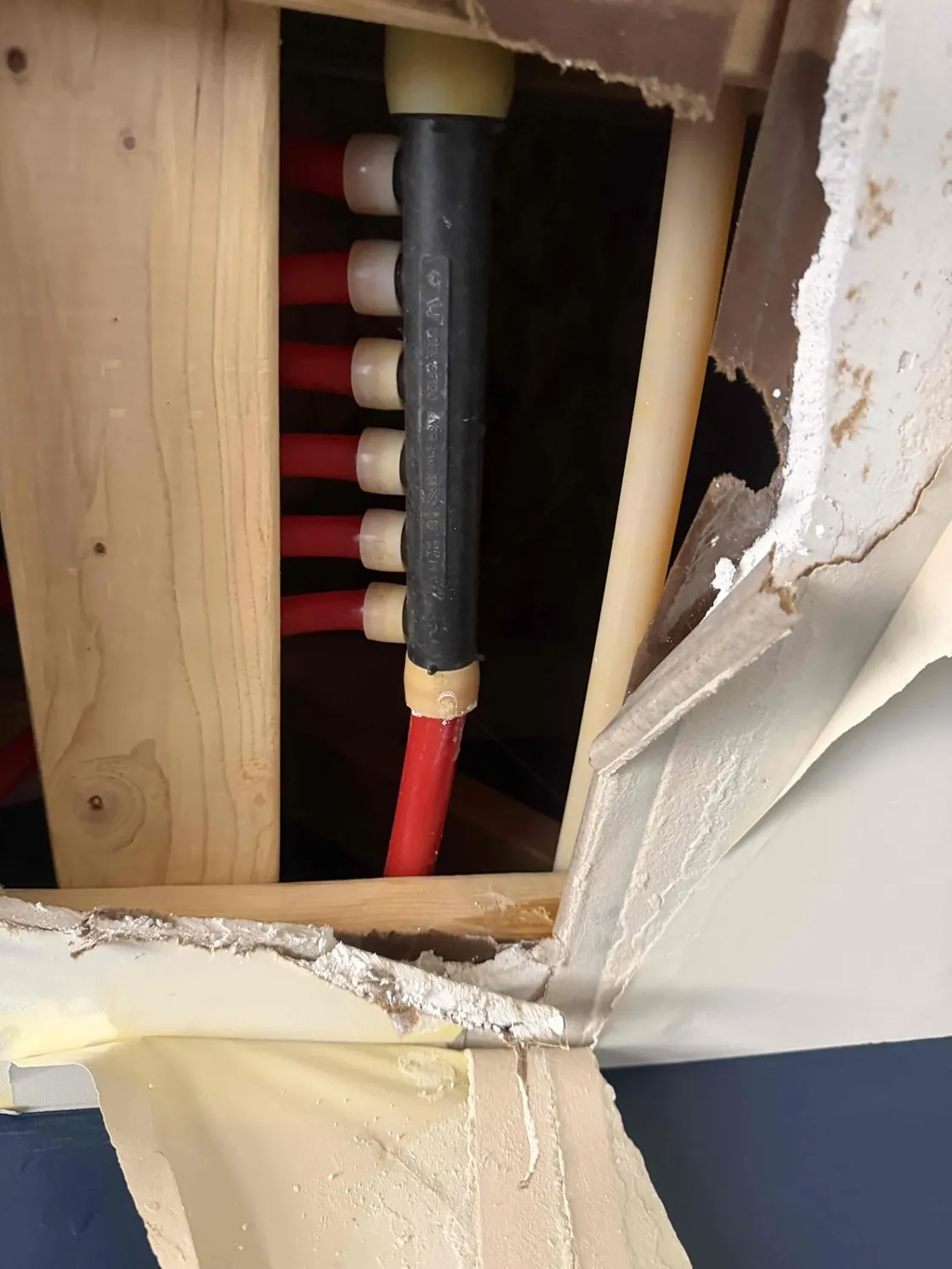 Water-supply connections exposed inside a wall