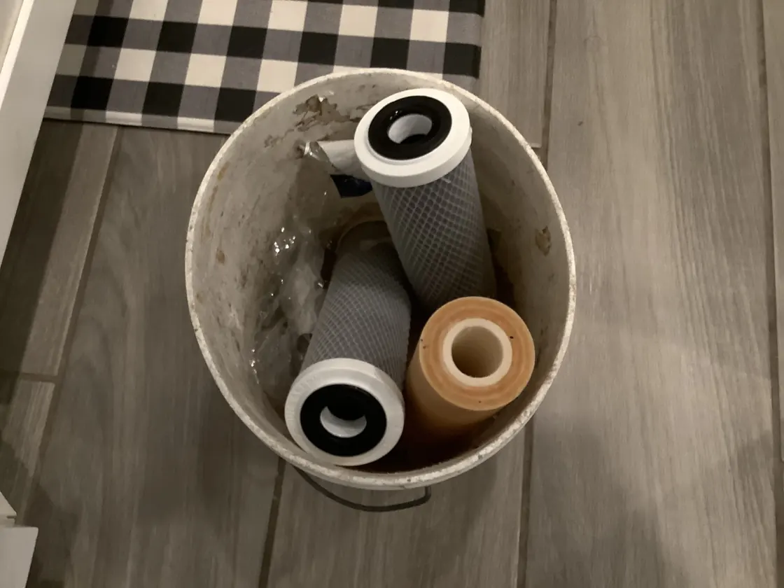 Used reverse osmosis filter cartridges removed during service