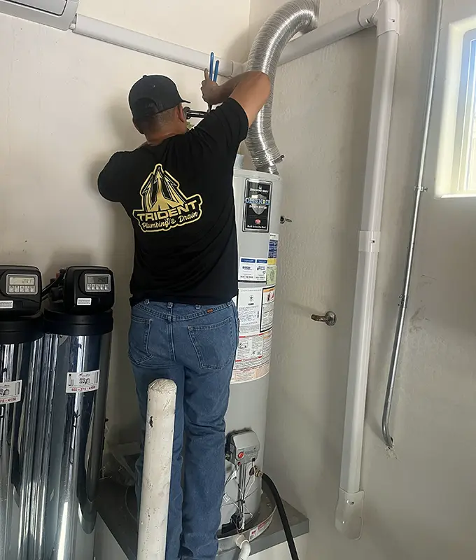 Ronnie working on water heater