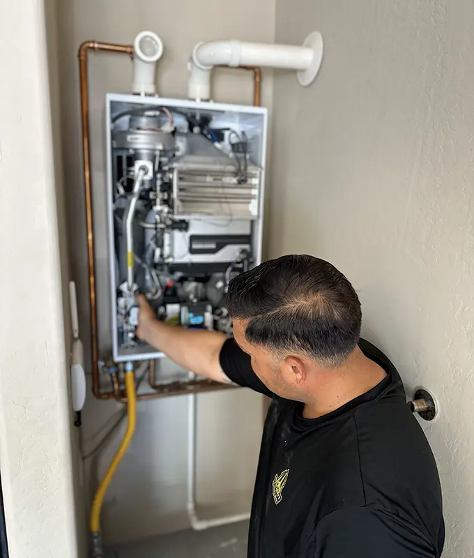 tankless water heater being repaired