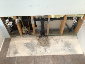 Exposed plumbing and drain system inspected during a pre-purchase plumbing inspection for potential drain cleaning needs.