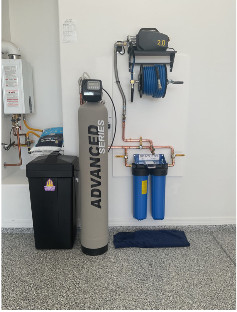 Whole-home water treatment system combining a water softener and carbon filtration for improved water quality.