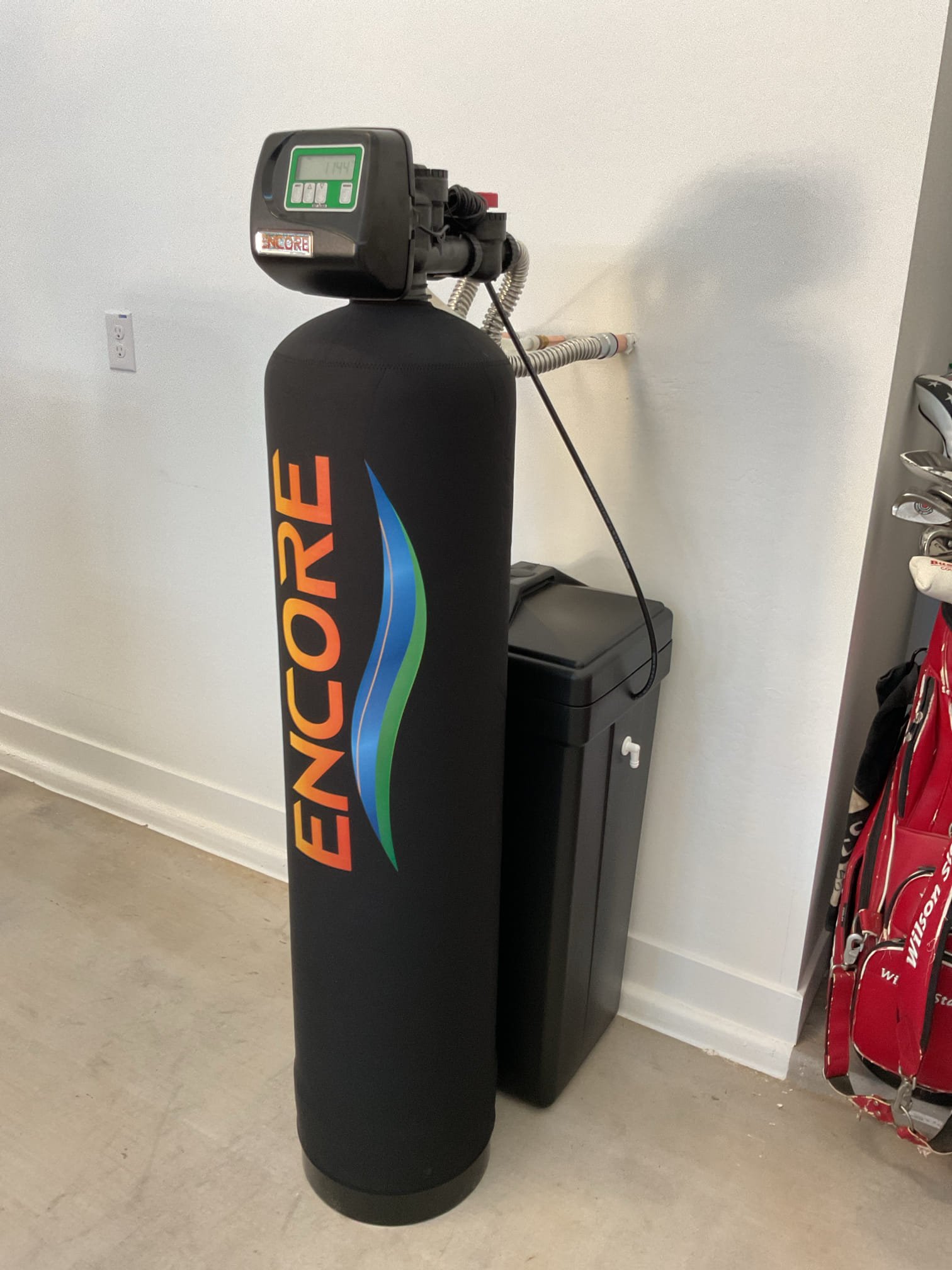 Whole-house water softener installed to reduce hard water and protect plumbing throughout the home.