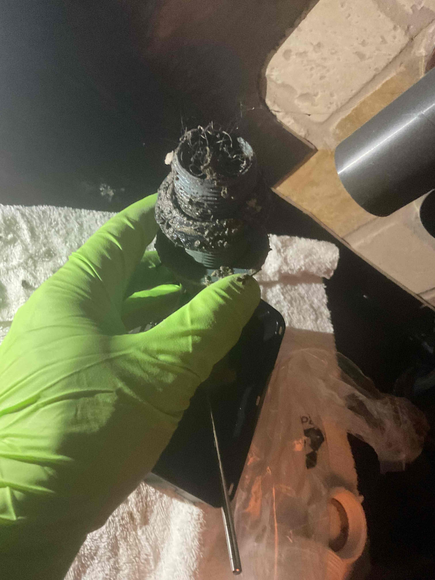 Hair and debris removed from a clogged sink drain in an Arizona home
