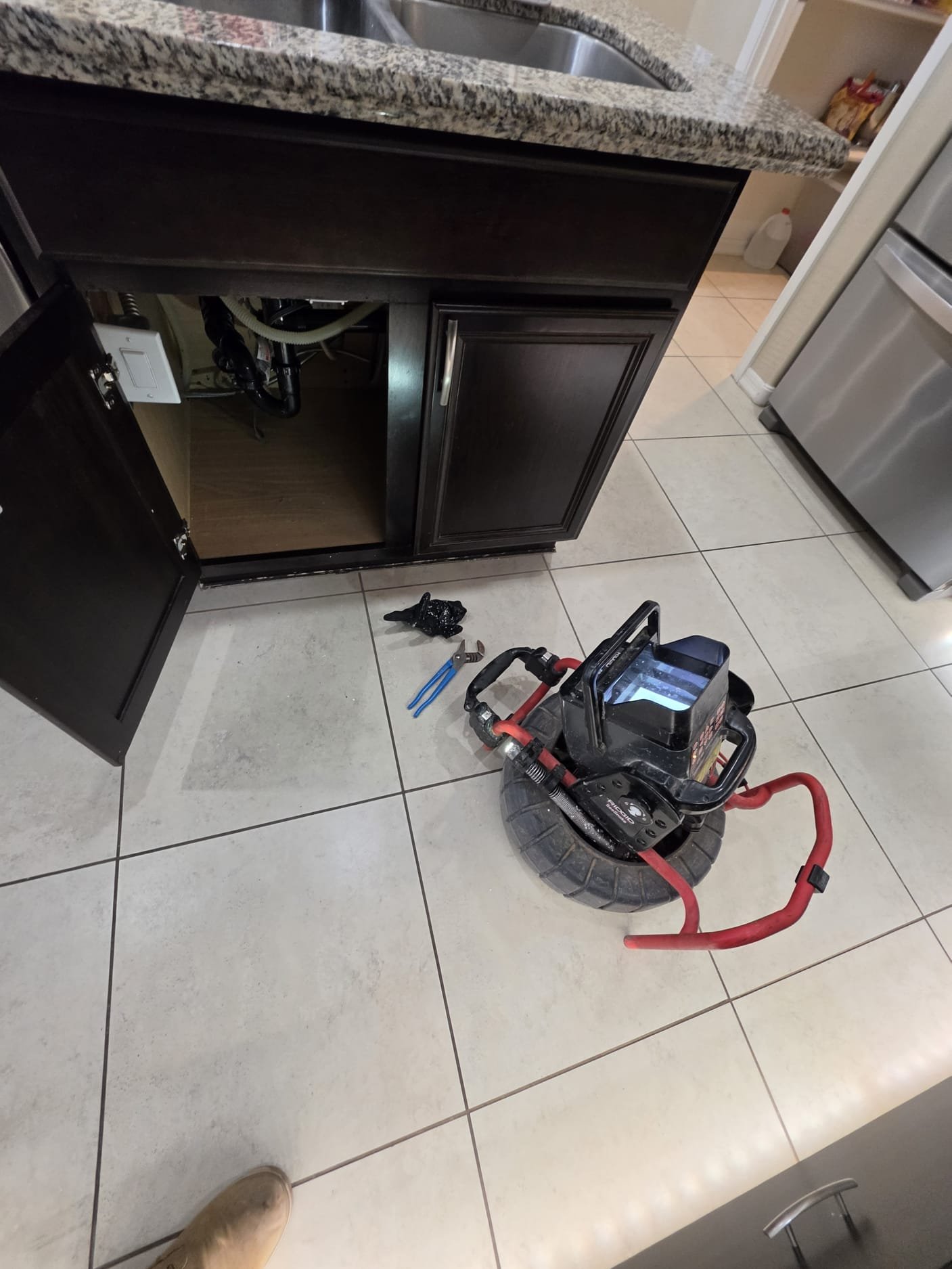 Professional kitchen drain cleaning equipment used to clear a clogged drain in Phoenix AZ