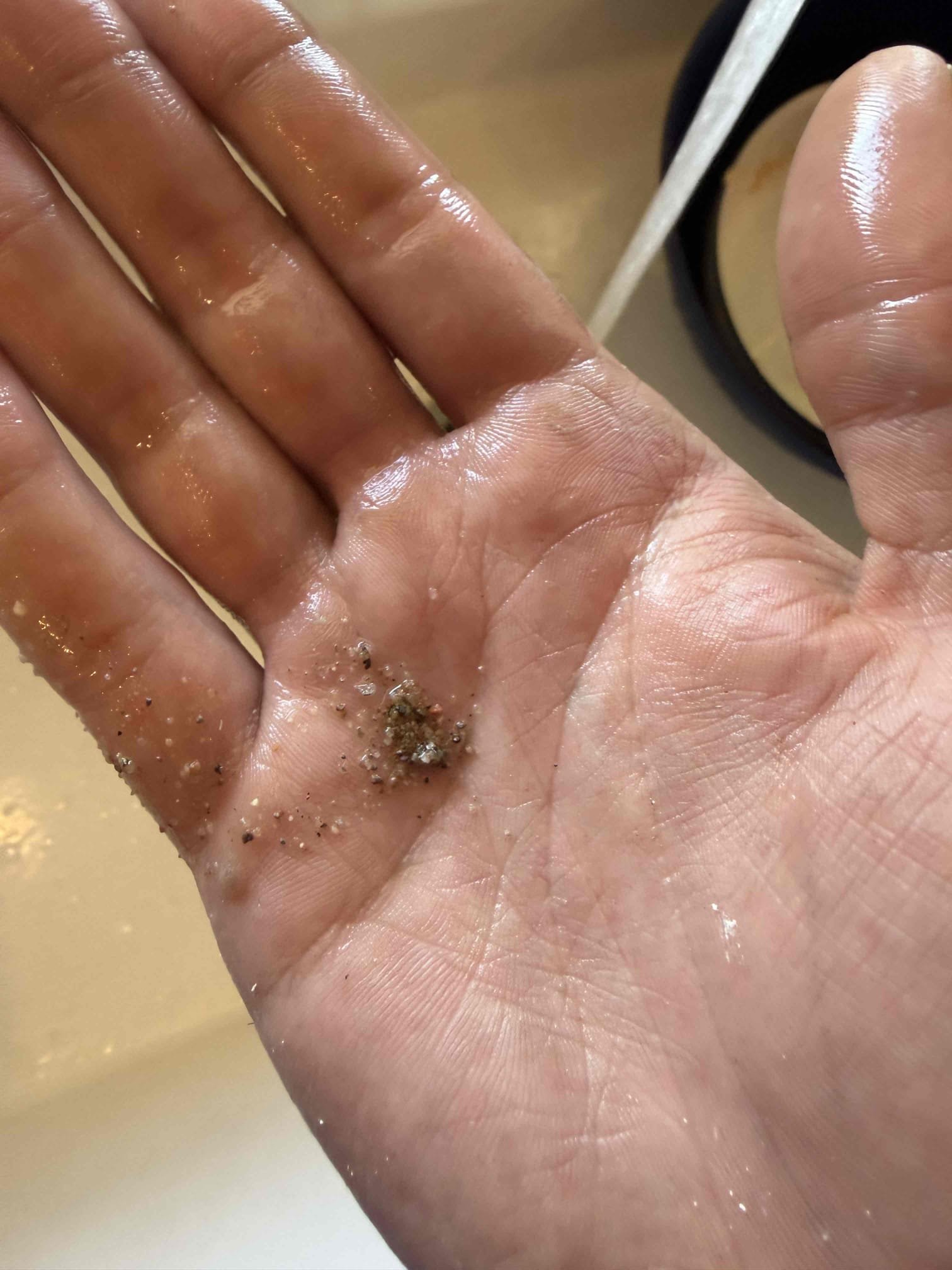 Debris removed from residential plumbing during professional service in Phoenix AZ