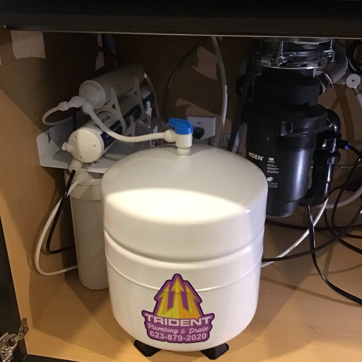 Reverse osmosis drinking water system installed under a kitchen sink in Phoenix, AZ.