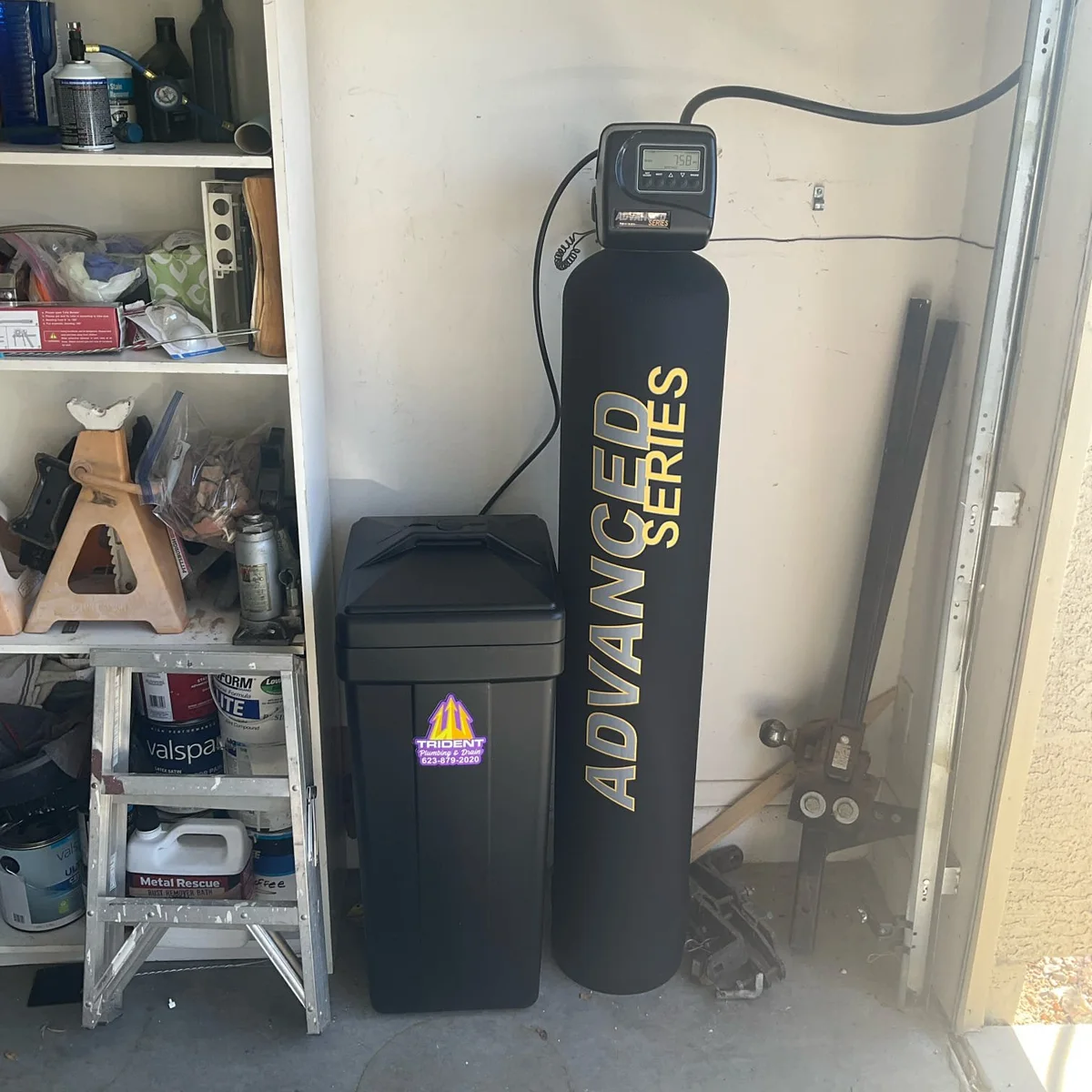 Advanced Series water softener and filtration system installed in a Sun City, AZ garage.